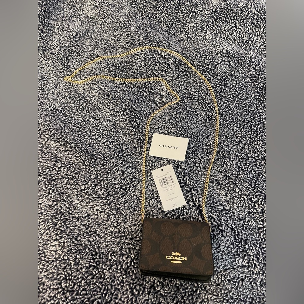 Coach Mini Wallet. Brown, with gold chain.